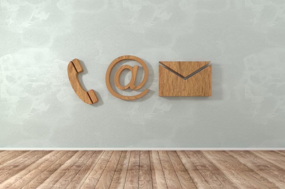 phone, email and letter icons against a grey background