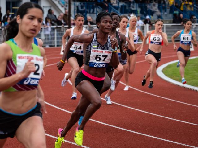 Female runners racing on a track